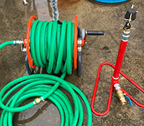 運送会社トラックヤードへの砂ぼこり対策用散水